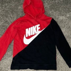 Nike black and red hoodie with pocket in the front